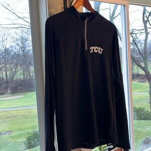 Large black men’s Under Armor loose fit quarter zip TCU shirt.
